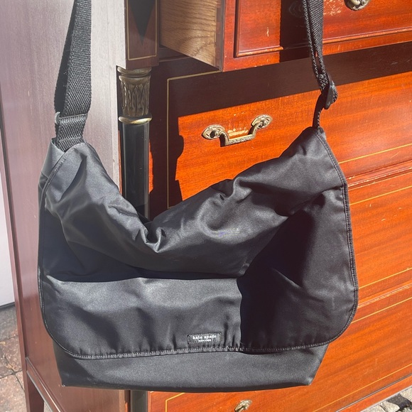 Black nylon late spade messenger diaper bag